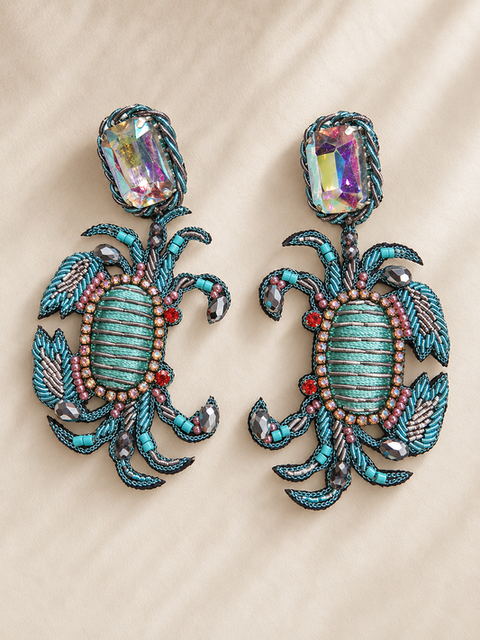 Boucles d’oreilles Crabe bleu brodées à la main
